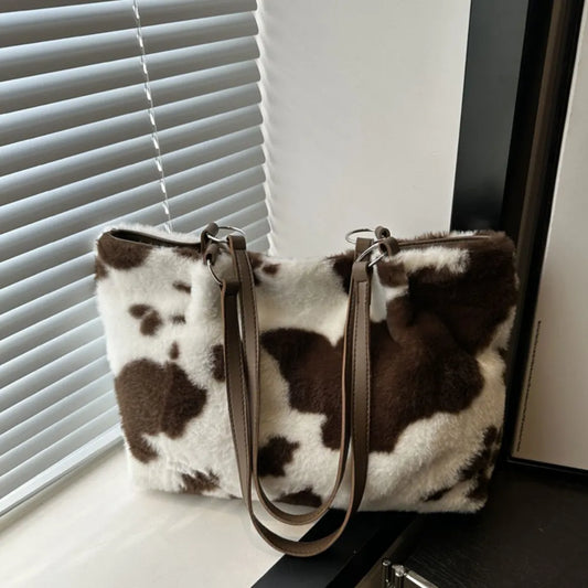Product image of Cow Print Furry Tote Bag from H&N Hearts online boutique