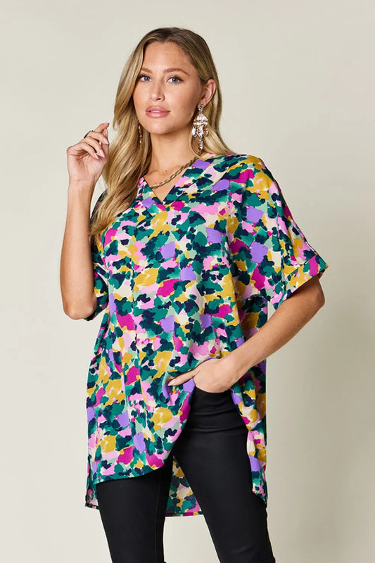 Product image of Double Take Full Size Printed V-Neck Short Sleeve Side Slit Top from H&N Hearts online boutique