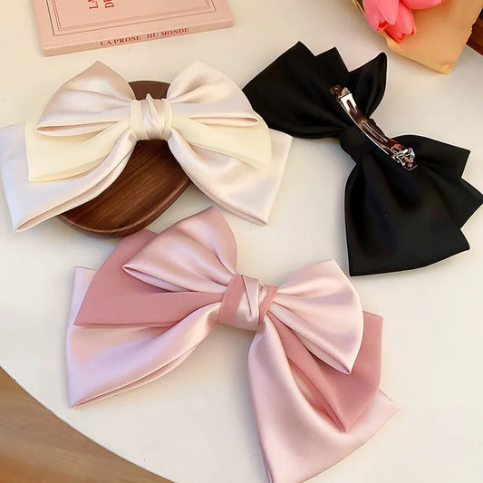 Product image of Bow Cloth Hair Clip from H&N Hearts online boutique