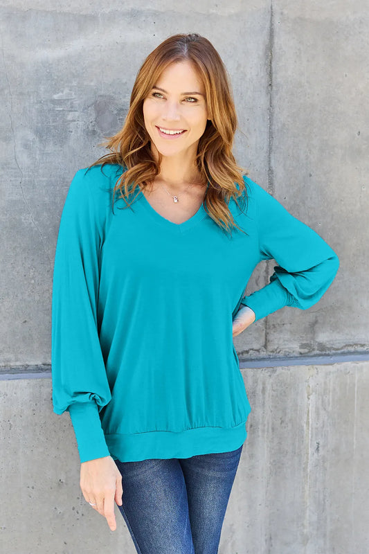 Product image of Basic Bae Full Size V-Neck Lantern Sleeve Top from H&N Hearts online boutique